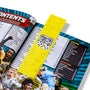 Open book with a yellow bookmark titled 'Guinness World Records 2026' on a sports-themed page.