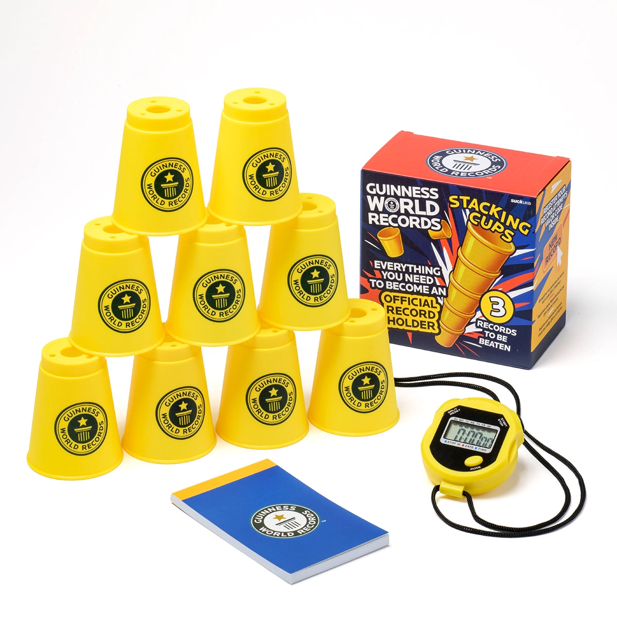 Guinness World Records Stacking Cups record kit with items layed out including stacked cups, nte book and stopwatch 