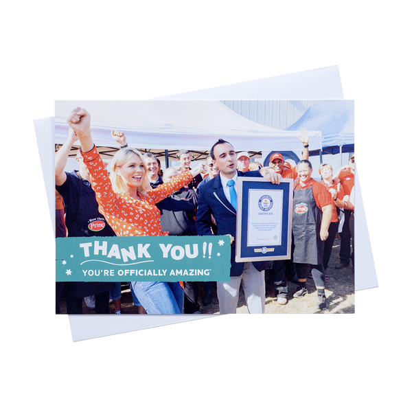 an a5 landscape thank you post card with a holding image of someone celebratin their new world record with envelope