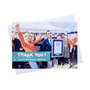an a5 landscape thank you post card with a holding image of someone celebratin their new world record with envelope