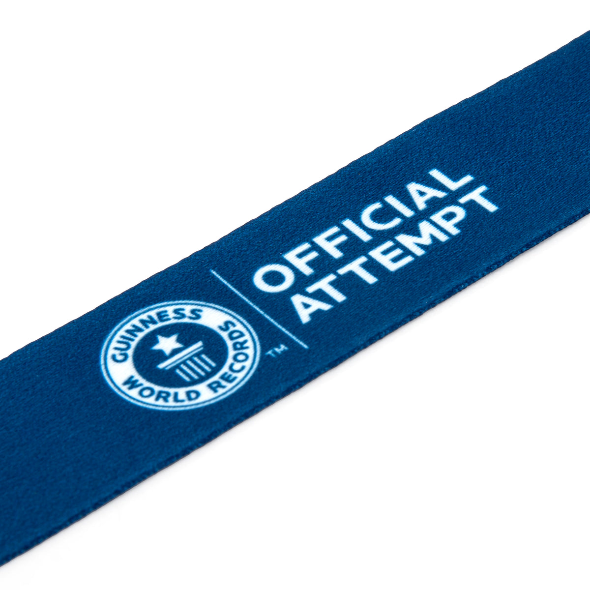 close up of the medallion ribbon featuring the official attempt logo