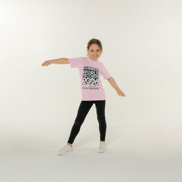 small girl wearing the pink I'm in the book t-shirt on a white background
