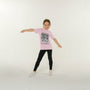 small girl wearing the pink I'm in the book t-shirt on a white background