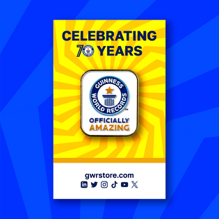 Guinness World Records Officially Amazing pin on yellow backing card on a blue background