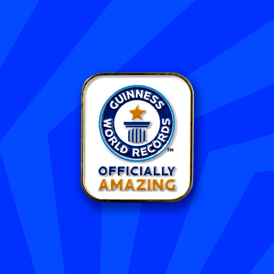 Guinness World Records Officially Amazing pin badge on a blue geometric background